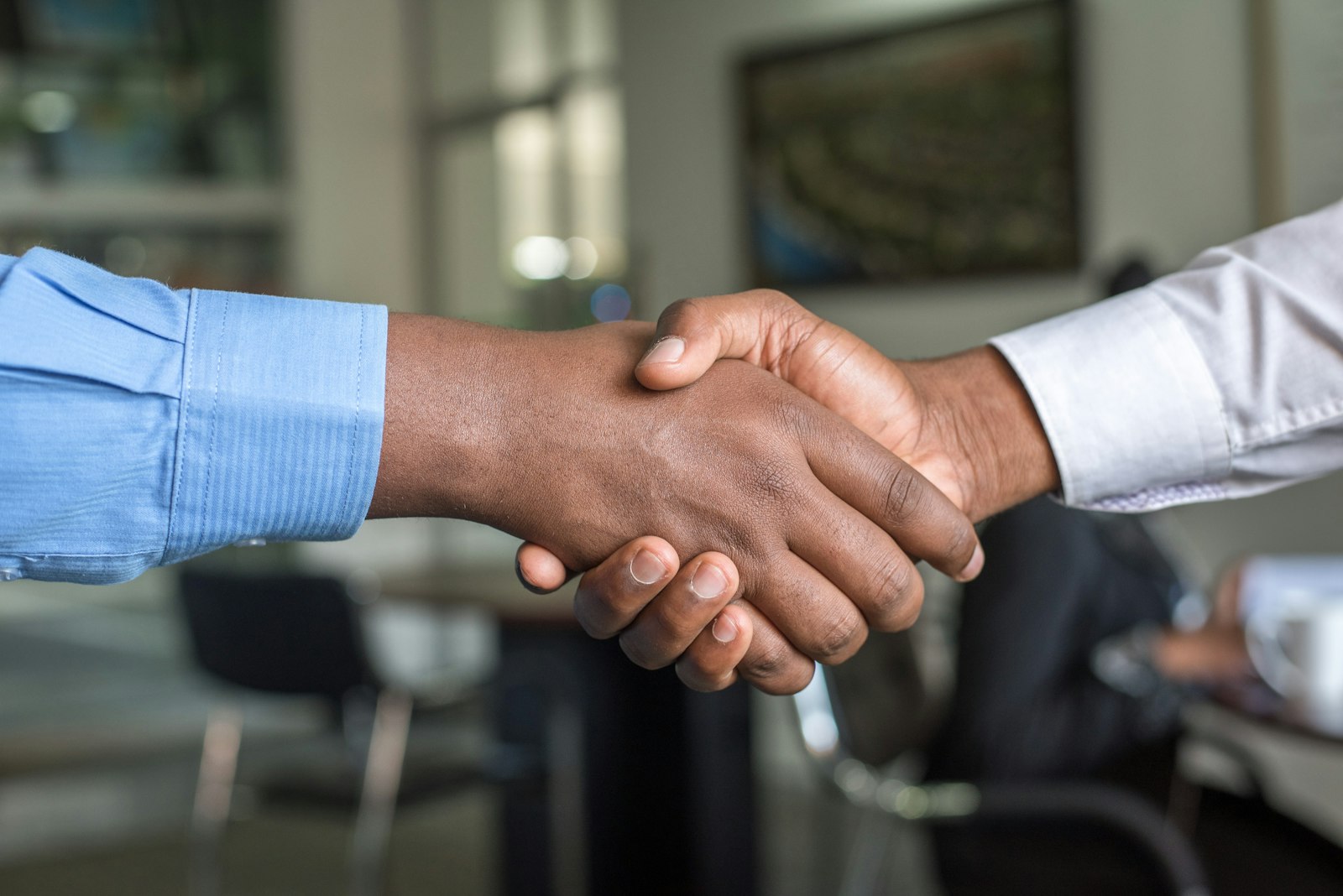 Handshake symbolizing a relationship pipeline and trusted business partnership